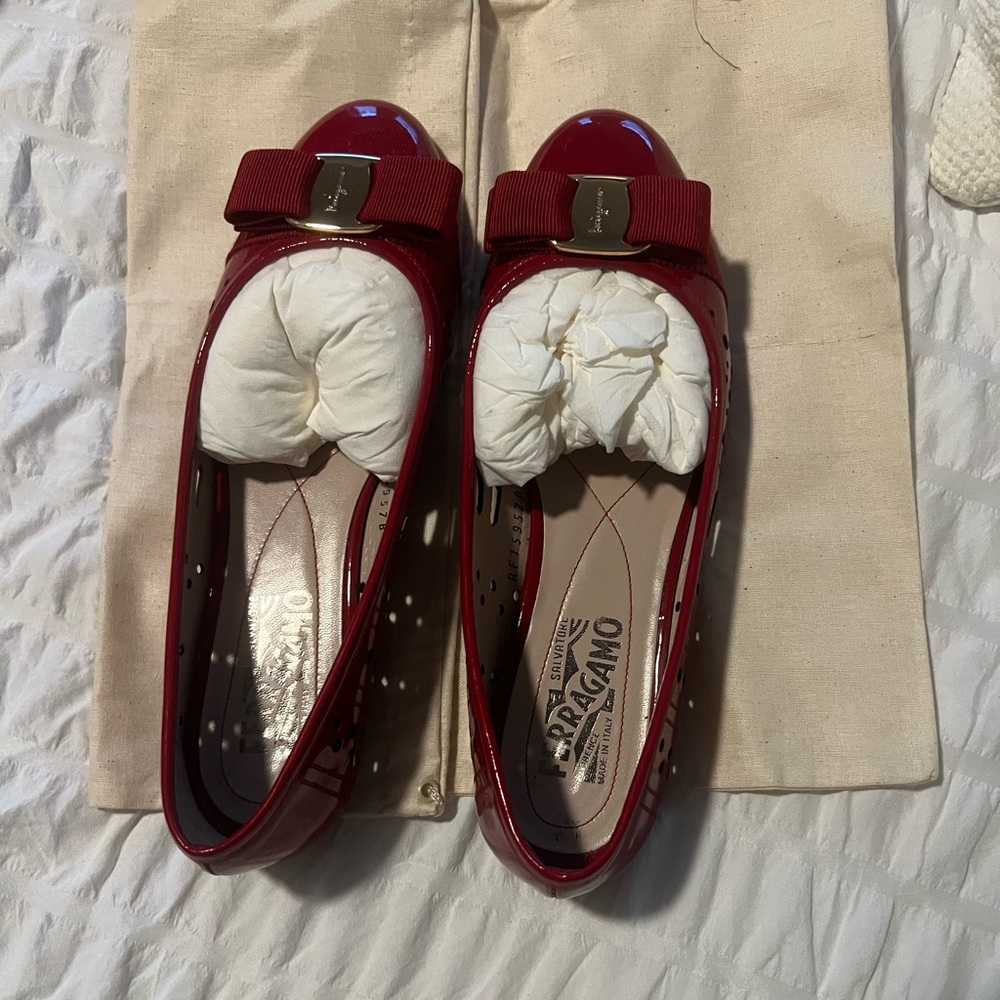 Red ferragamo flats with cut out pattern, size 7.5